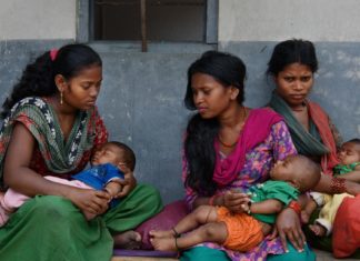 Women with new born babies in Asia