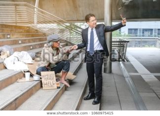 Keep the camera aside while helping poor